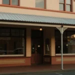 Restored Victorian shopfront facade on a regional Australian main street at first light